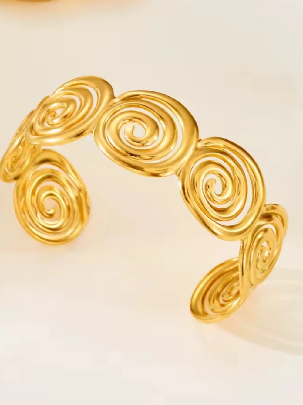 Golden Spiral Cuff Bracelet – Modern Sculptural Statement Jewelry